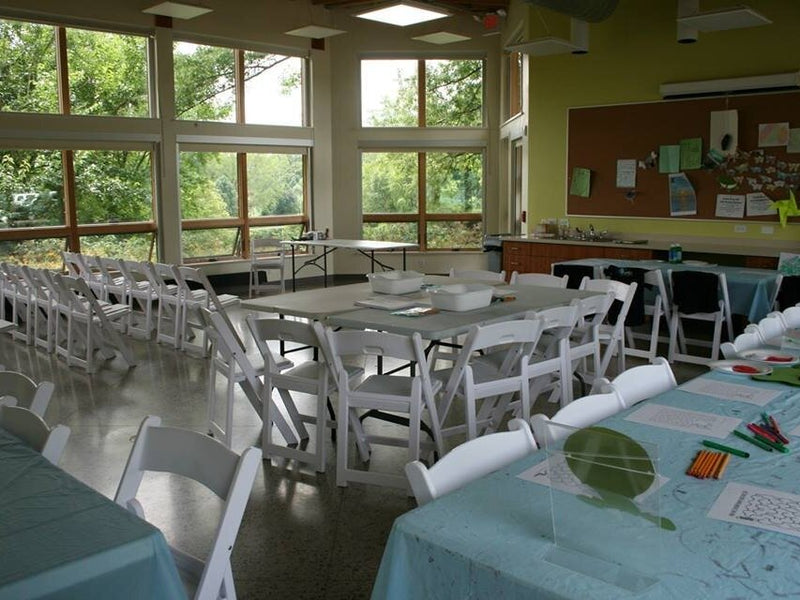 LEAF Education Center. The space includes 10 tables and 75 chairs, and features natural lighting and large windows overlooking the arboretum.